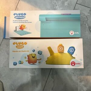 Plugo count and Plugo game pad. Like new